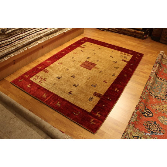 Persian Gabbeh Rug, Fine Quality Persian Rug, Beige Background.