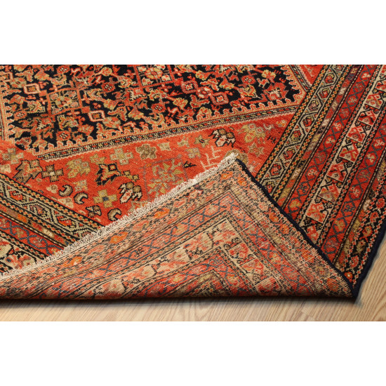 Orange background Vintage Persian Malayer Rug measures 6'6" x 16'